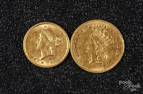Two US one dollar gold coins, 1852 and 1856.