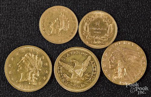 Two US one dollar gold coins 1855 and 1862, etc.
