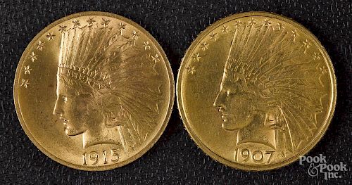 Two US ten dollar gold coins 1907 and 1915.