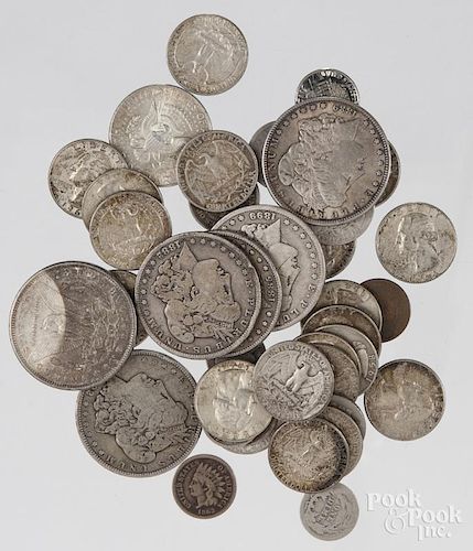 US coins, to include six Morgan silver dollars.