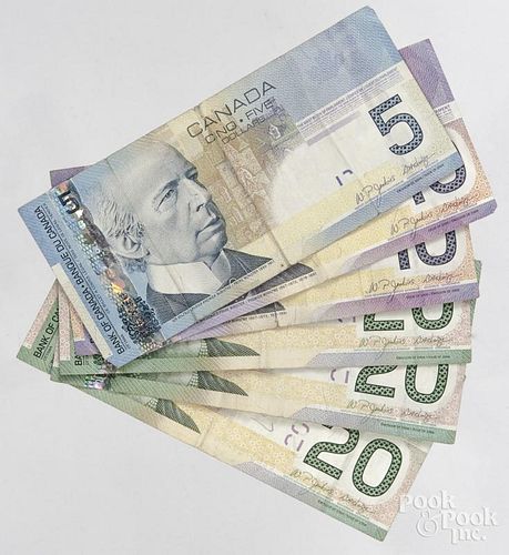 Canadian paper currency, $85 face value.