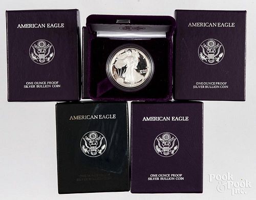 Five American eagle 1 ozt. silver bullion coins.