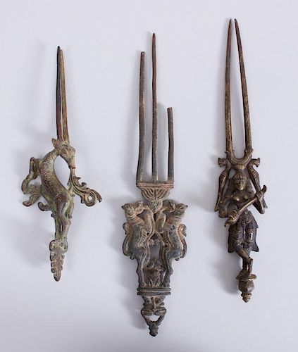 GROUP OF THREE INDIAN BRONZE AND METAL HAIR COMBS