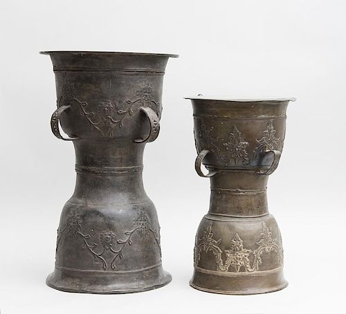 TWO SIMILAR INDIAN METAL DRUMS WITH HANDLES