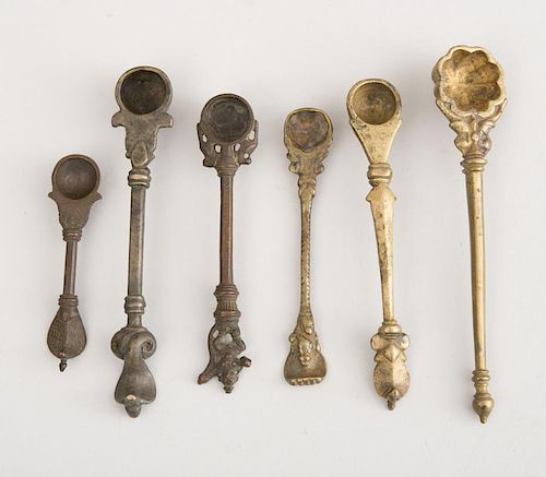 GROUP OF ELEVEN INDIAN BRONZE, COPPER AND BRASS SPOONS