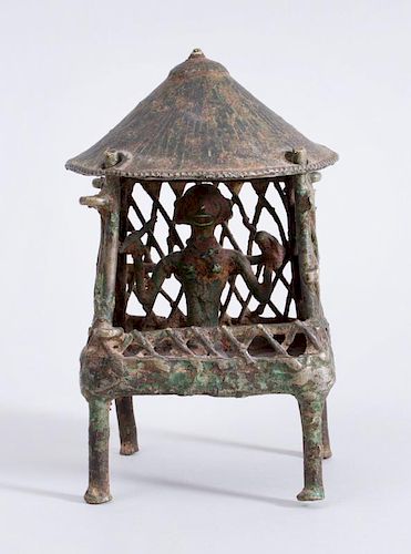 INDIAN METAL FIGURE SEATED UNDER A CANOPY, BASTAR