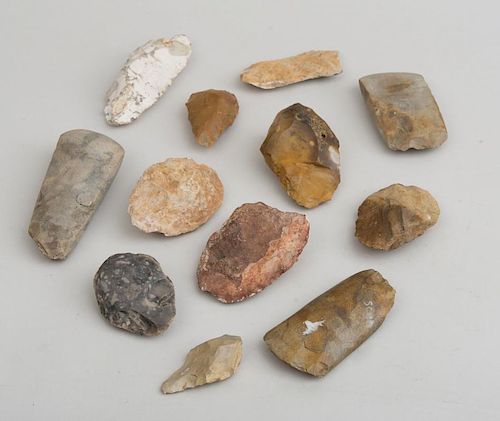 GROUP OF TWENTY-THREE NEOLITHIC STONE AXES AND KNIVES