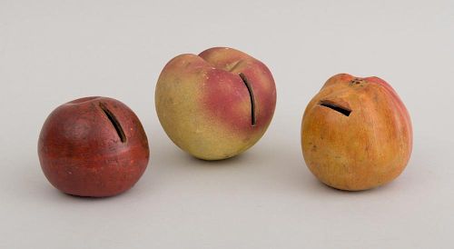 GROUP OF THREE AMERICAN REDWARE APPLE-FORM BANKS