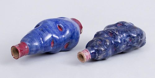 PAIR OF STAFFORDSHIRE BLUE-GLAZED POTTERY POTATO-FORM GIN DECANTERS