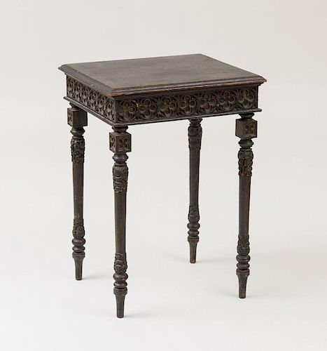 ENGLISH GOTHIC REVIVAL CARVED AND PAINTED SIDE TABLE, AFTER A MODEL BY GILLOWS