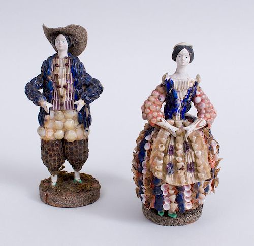 PAIR OF CONTINENTAL COLORED SHELLWORK FIGURES OF A LADY IN STRIPPED SKIRT AND A YOUTH WEARING HAT