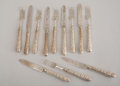 SET OF SIX INDIAN SILVER-HANDLED FRUIT KNIVES AND FORKS