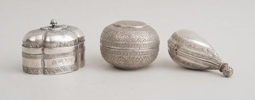 TWO INDIAN ENGRAVED SILVER BOXES AND A SILVER-PLATED SPHERICAL BOX AND COVER