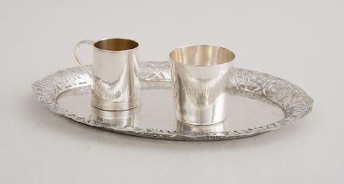 CONTINENTAL SILVER OVAL TRAY WITH PIERCED SCROLL WORK BORDER, A MONOGRAMMED SILVER CUP AND A SMALL SILVER MUG