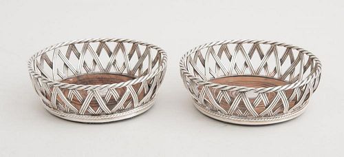 PAIR OF ENGLISH SILVER-PLATED BOTTLE COASTERS