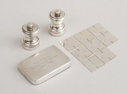 TIFFANY & CO. SILVER SEVEN-PIECE PUZZLE, A PAPERWEIGHT, AND A PAIR OF ITALIAN SILVER PEPPER MILLS RETAILED BY TIFFANY & CO.