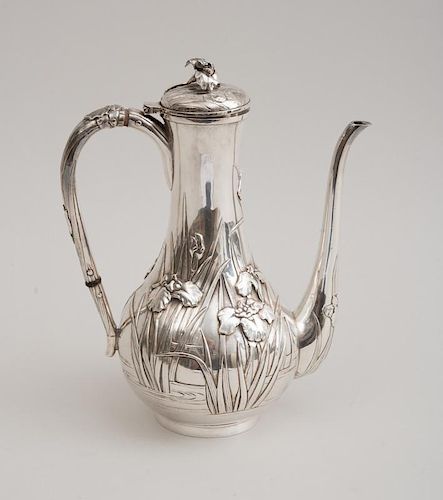 JAPANESE RELIEF-DECORATED SILVER DEMITASSE POT