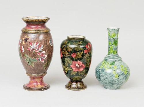 THREE CERAMIC VASES DECORATED WITH FLOWERS, ONE BY JOHN BENNETT