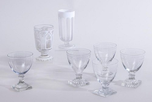 FIVE CLEAR GLASS GOBLETS ON SQUARE BASES AND TWO WHITE CASED GLASS VASES