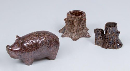 'SEWER TILE' MODEL OF A PIG AND TWO TREE TRUNK-FORM SPILL VASES