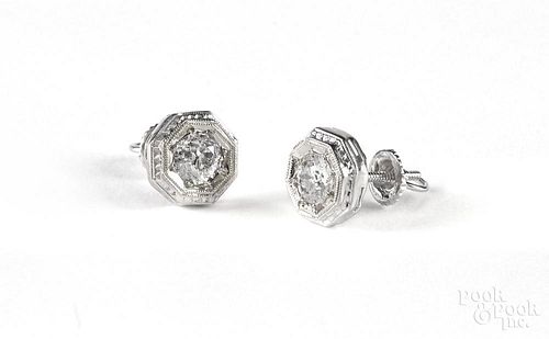 Pair of platinum and miners cut diamond earrings