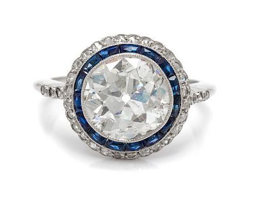 A Platinum, Diamond and Sapphire Ring, 3.70 dwts.