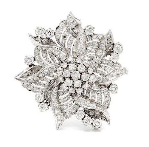 A Platinum and Diamond Floral Motif Brooch, 13.90 dwts.