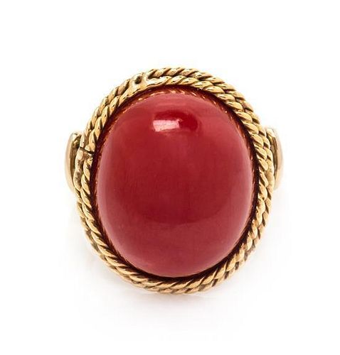 A Yellow Gold and Coral Ring, 6.60 dwts.