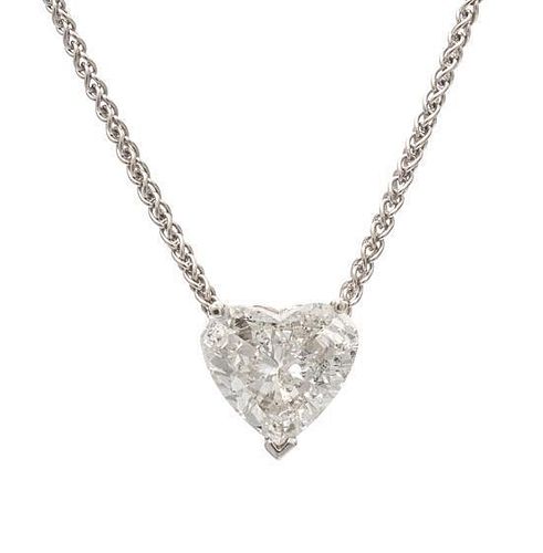 A White Gold and Diamond Heart Solitaire Pendant, 4.50 dwts.
