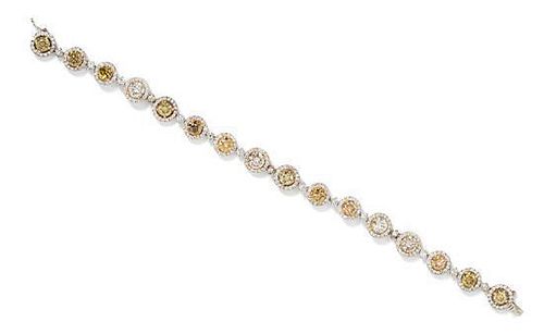 A Bicolor Gold, Colored Diamond and Diamond Bracelet, 8.70 dwts.