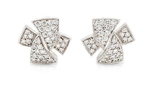 A Pair of 18 Karat White Gold and Diamond Earclips, Alain Roure, Circa 2007, 7.90 dwts.