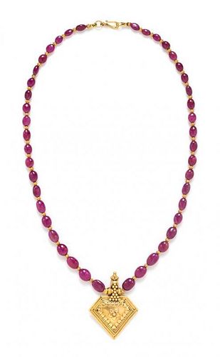A Yellow Gold and Ruby Bead Necklace, 28.10 dwts.