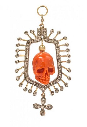 A Silver Topped Yellow Gold, Carved Coral Skull and Diamond Pendant, 5.90 dwts.