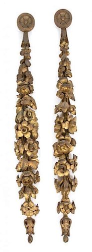 A Pair of Italian Floral Carved Giltwood Wall Mounts Length 31 inches.