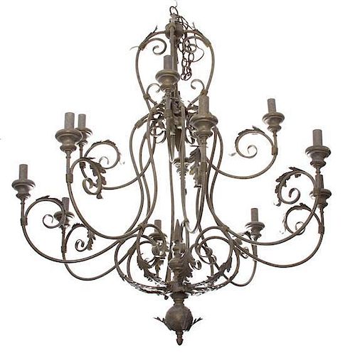 A Twelve-Light Louis XV Style Patinated Metal Chandelier Height 36 x diameter 45 inches.