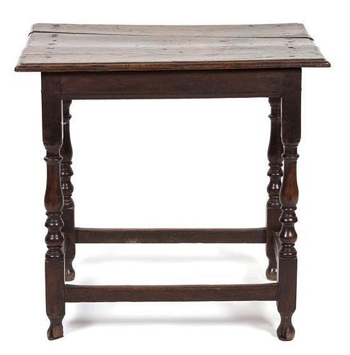 A Jacobean Style Oak Side Table Height 27 7/8 inches.