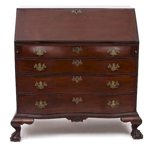 An American Chippendale Style Mahogany Slant Front Oxbow Desk Height 45 x width 46 x depth 25 inches.