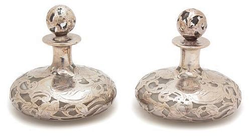 A Pair of Art Nouveau Silver Overlay Glass Perfumes Height 5 inches.