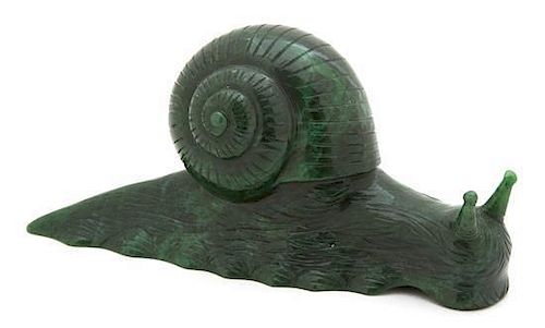 A Chinese Carved Green Hardstone Model of a Snail Length 4 _ inches.