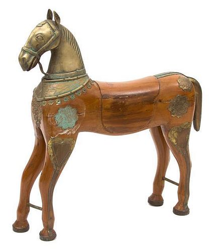 A Brass Mounted Carved Wood Model of a Horse Height 26 inches.