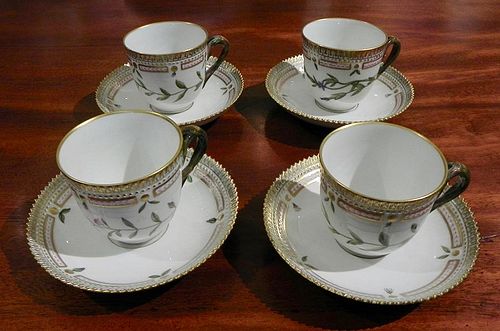 Set of four Flora Danica tea cups and saucers