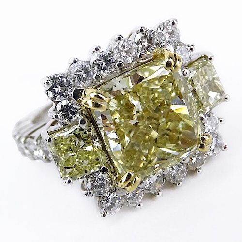 Approx. 8.71 Carat TW Fancy Yellow Diamond, White Diamond, Platinum and 18 Karat Yellow Gold Engagement Ring.