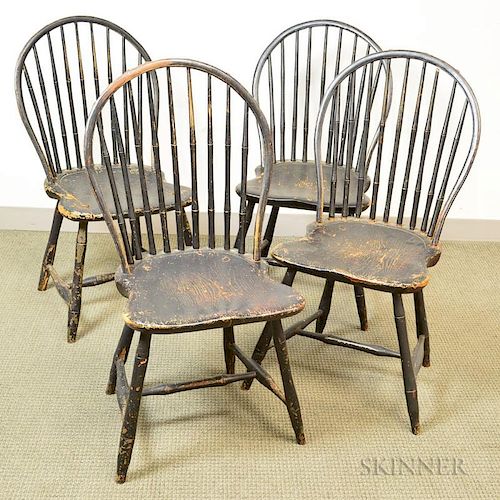 Two Pairs of Black-painted Bow-back Windsor Chairs, ht. to 36 1/2 in.