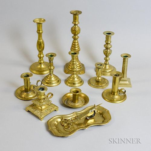 Eleven Brass Candlesticks, a Pair of Wick Cutters, and a Tray, ht. to 11 in.