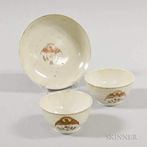 Three Chinese Export Armorial Porcelain Items, two teacups and a saucer with eagle crest, (imperfections), ht. 2, dia. 5 3/4