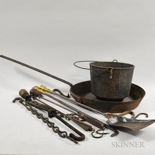 Eleven Wrought Iron Hearth Items, including hooks, a shovel, a pot, a pan, and a poker.