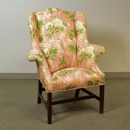 Mahogany Easy Chair, with serpentine crest and slightly tapering molded legs, pink floral upholstery, (back leg pieced), ht.