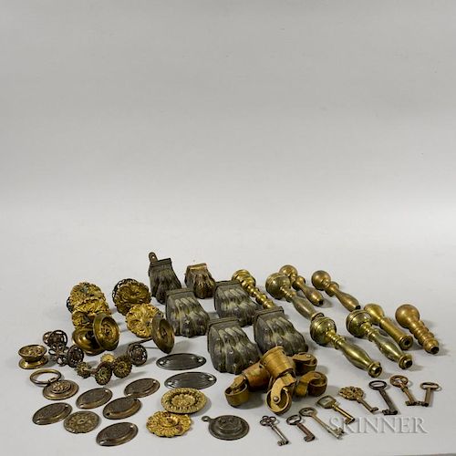 Group of Metal Hardware, including assorted turned brass finials, casters, and keys.