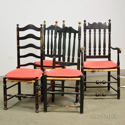 Three Black-painted Bannister-back Chairs and a Ladder-back Chair, (imperfections), ht. to 45 1/2 in.