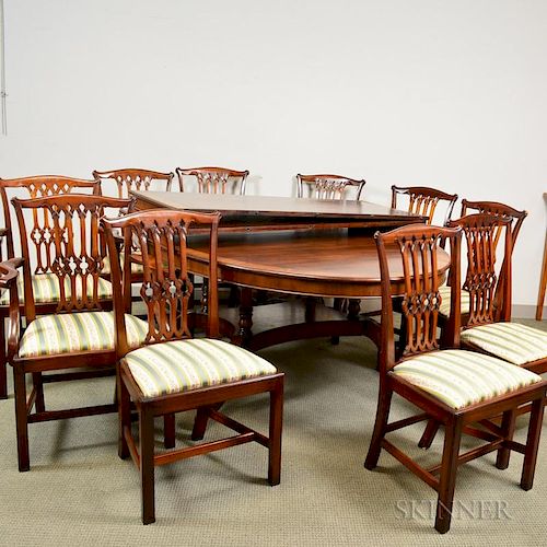Regency-style Mahogany Extension Dining Table and a Set of Ten Chippendale-style Mahogany Dining Chairs.
